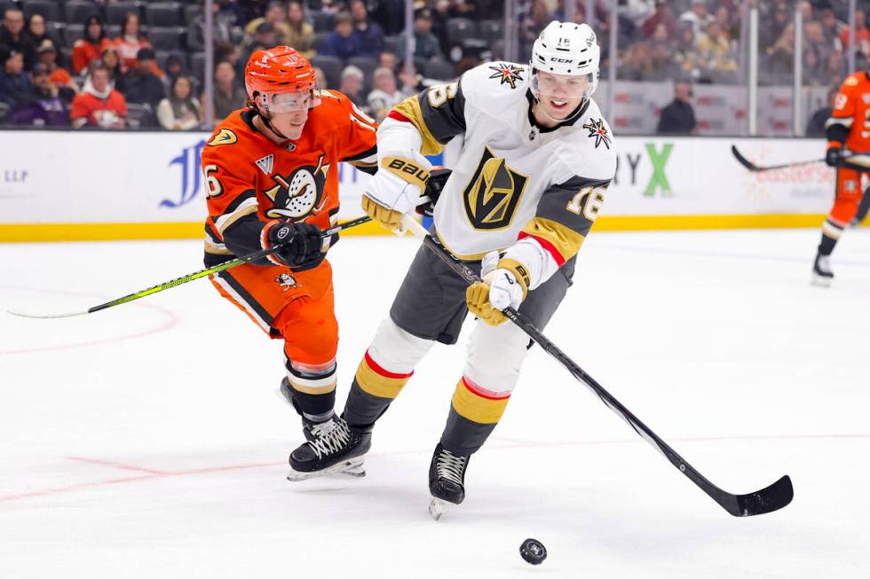 Vegas Golden Knights left wing Pavel Dorofeyev, right, controls the puck against Anaheim Ducks ...