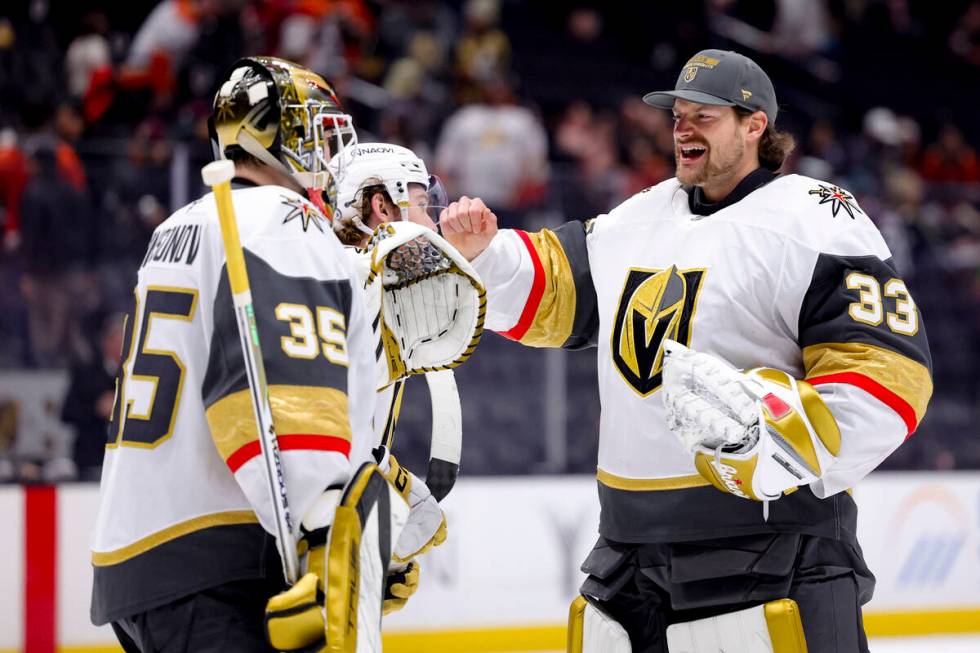 Vegas Golden Knights goaltender Ilya Samsonov, left, celebrates with goaltender Adin Hill after ...