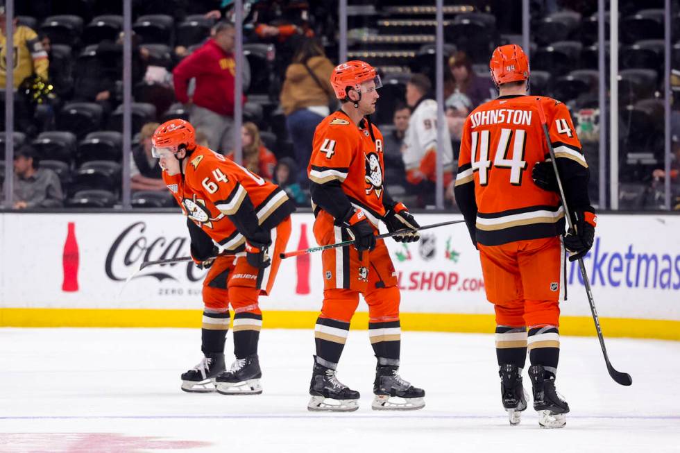 From left, Anaheim Ducks right wing Sam Colangelo, defenseman Cam Fowler, and left wing Ross Jo ...