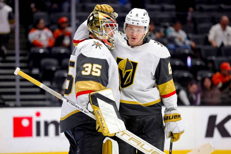 Vegas Golden Knights goaltender Ilya Samsonov, left, and defenseman Kaedan Korczak celebrate af ...