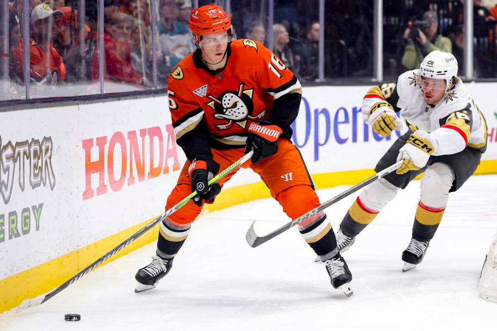 Anaheim Ducks center Ryan Strome, left, and Vegas Golden Knights right wing Alexander Holtz vie ...