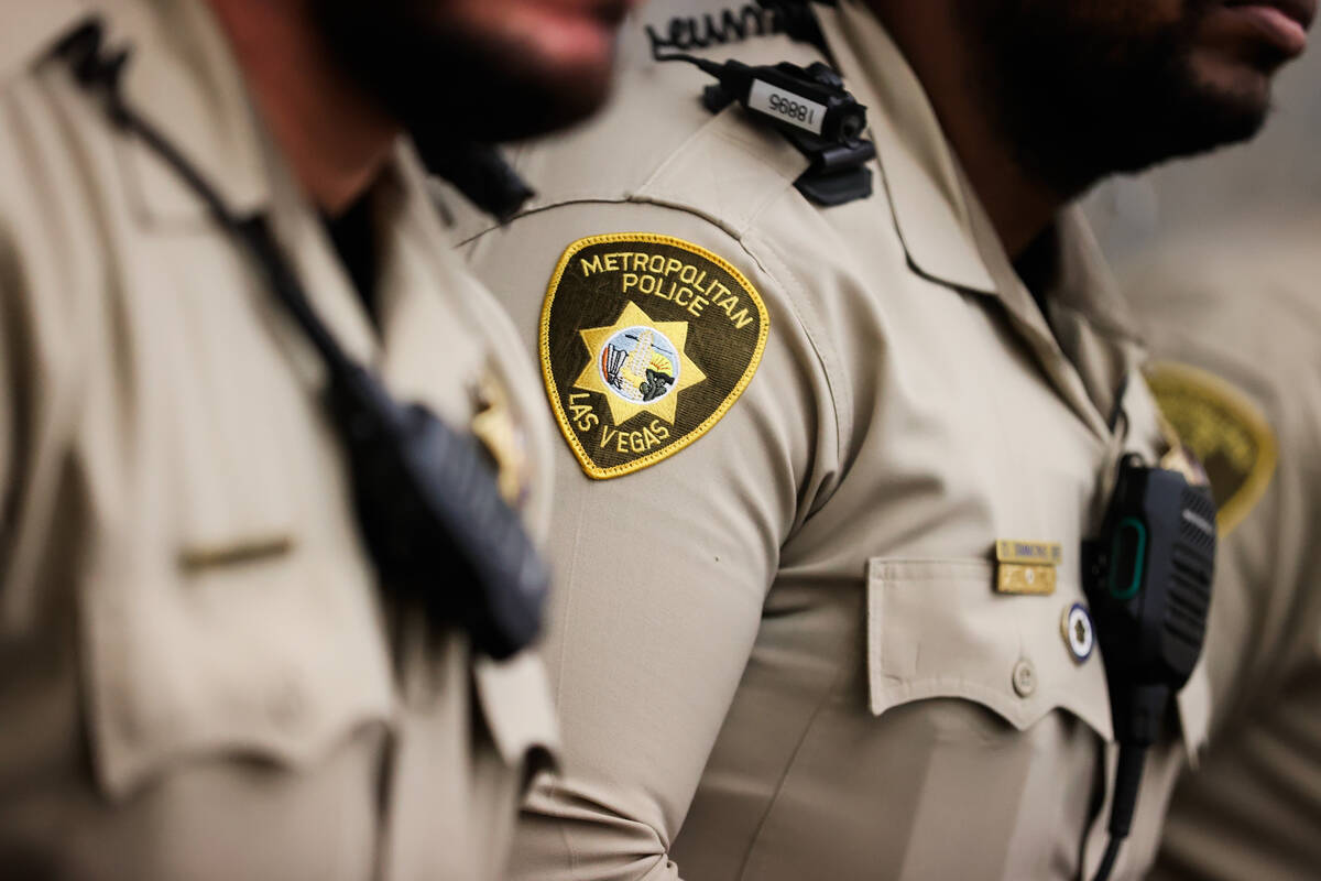 Metropolitan Police Department officers listen during a community meeting on unsafe driving and ...