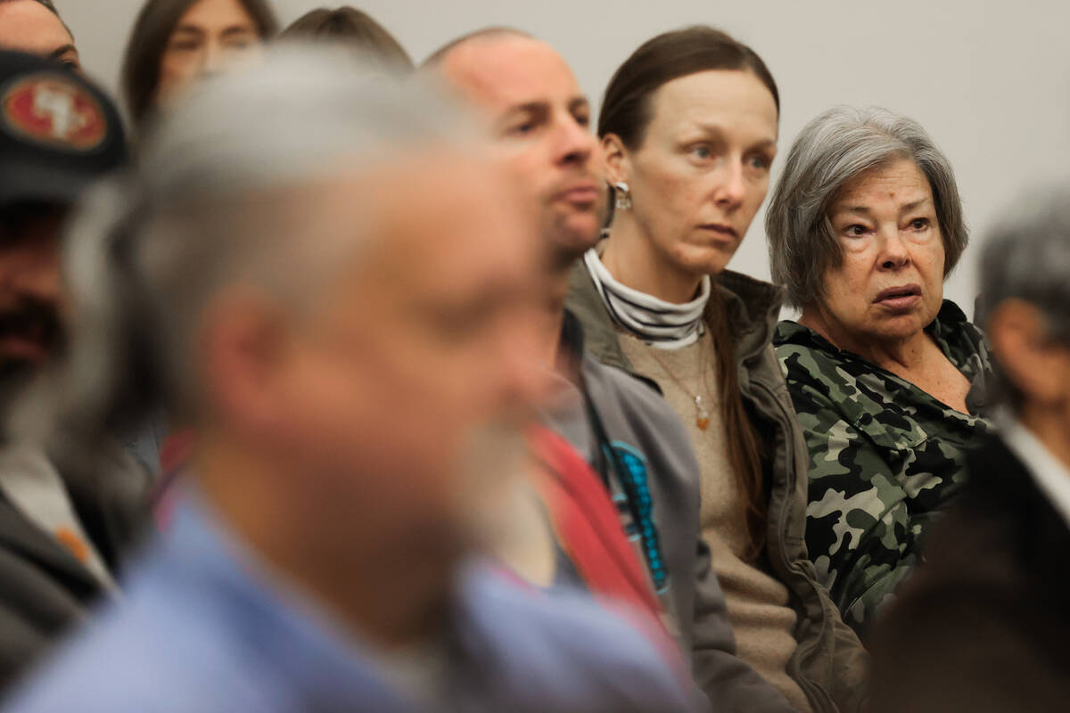 Community members listen during a community meeting on unsafe driving and doughnuts with the Me ...