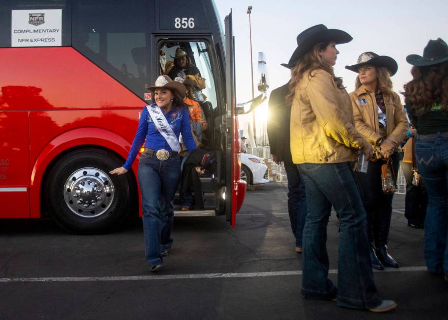 A group of state Miss Rodeo queens exit a charter bus before opening night of the National Fina ...