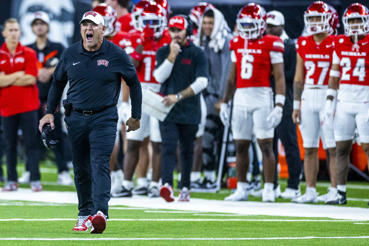 UNLV head coach Barry Odom emphasizes his point to a referee against the Boise State Broncos du ...