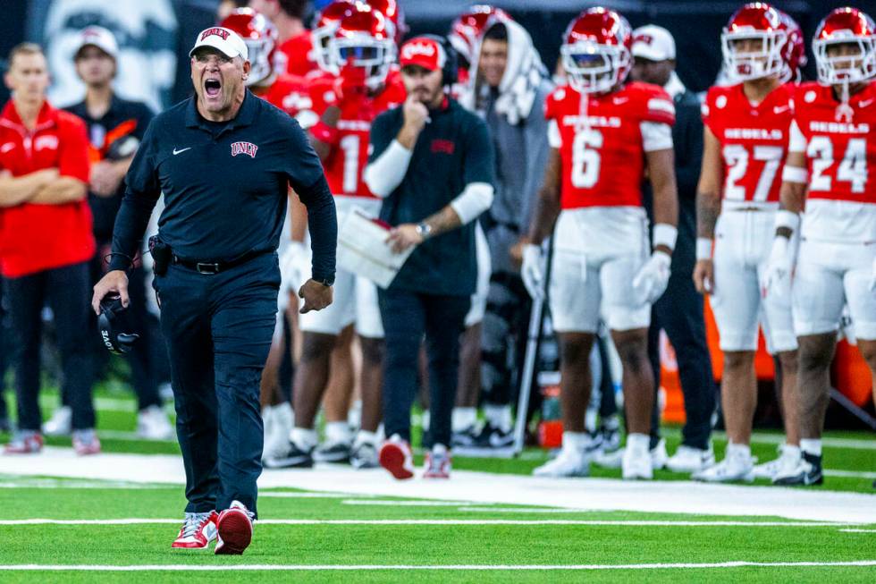 UNLV head coach Barry Odom emphasizes his point to a referee against the Boise State Broncos du ...