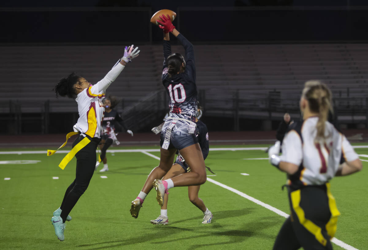 Liberty's safety Nai’a Pomaikai (10) makes an interception on a pass intended for Del So ...