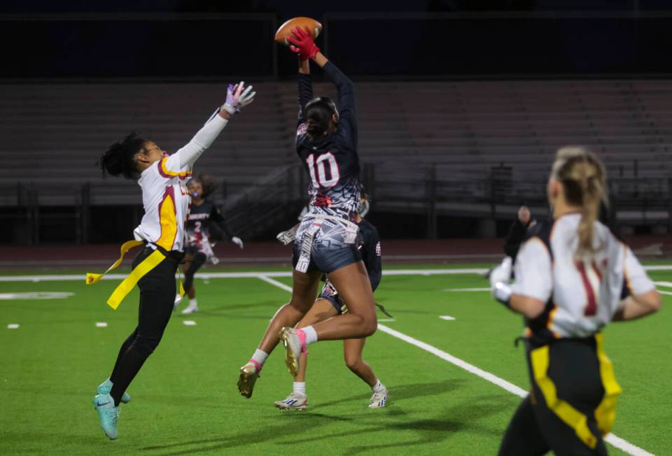 Liberty's safety Nai’a Pomaikai (10) makes an interception on a pass intended for Del So ...