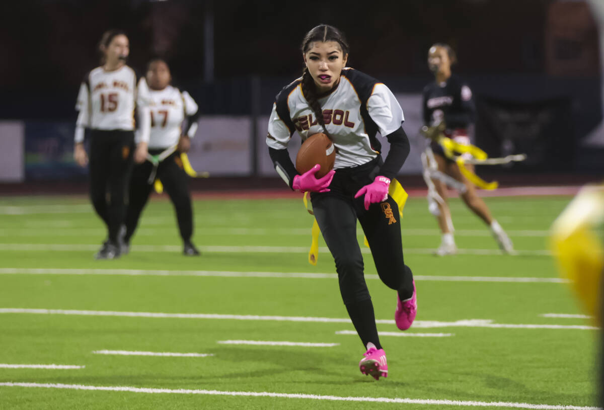 Del Sol’s Savannah Oyamot-Bridglal runs the ball during a flag football game at Liberty ...