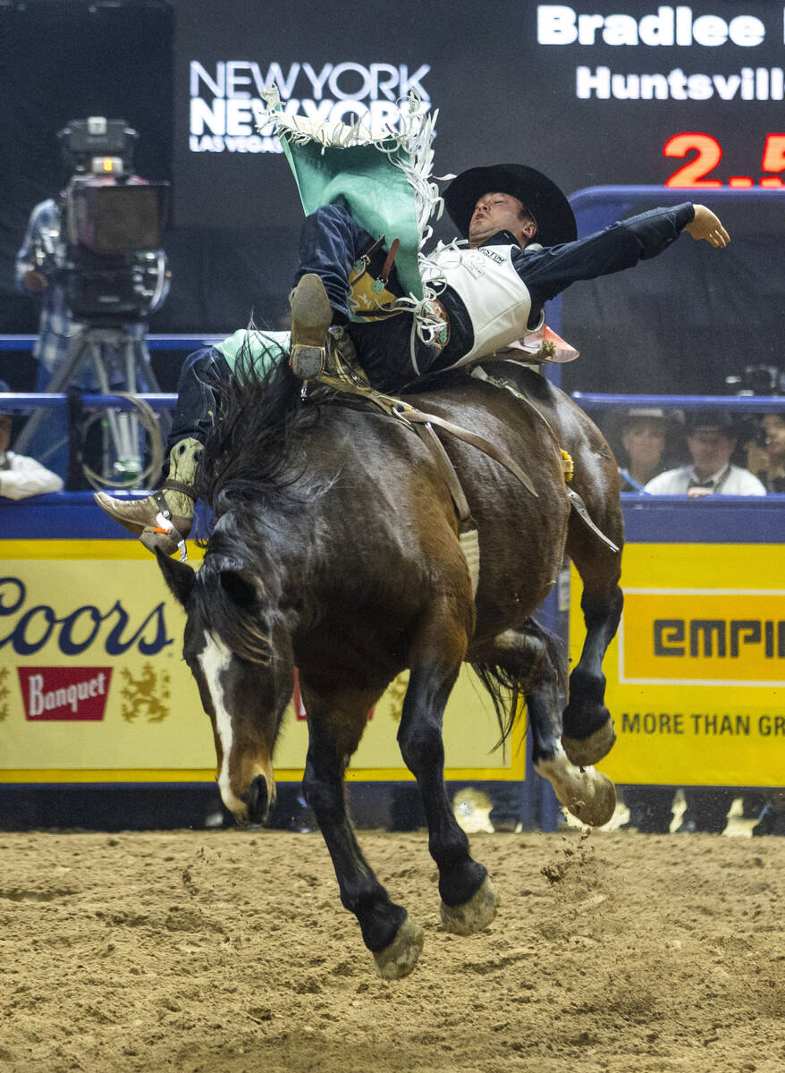 Bareback rider Bradlee Miller rides True Grit to a winning time during National Finals Rodeo Da ...