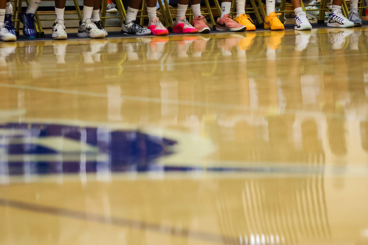 Democracy Prep players sit on the sidelines during a boys basketball game between Mater East an ...