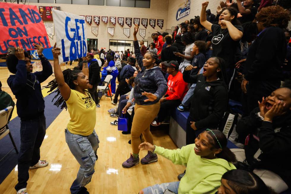 Democracy Prep fans cheer during a boys basketball game between Mater East and Democracy Prep a ...