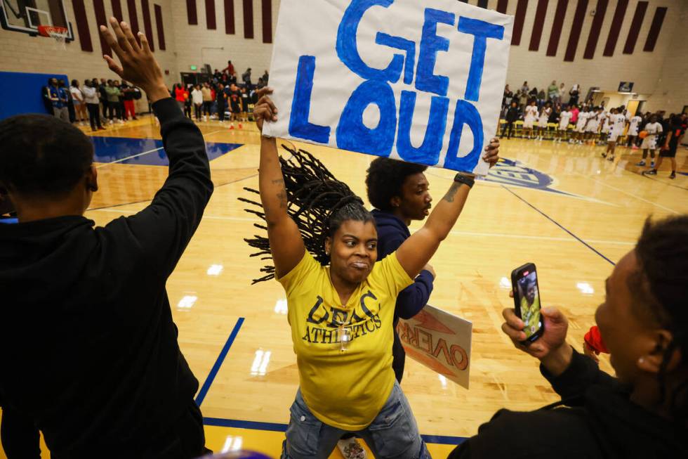 Democracy Prep fans cheer in the final moments of a boys basketball game between Mater East and ...