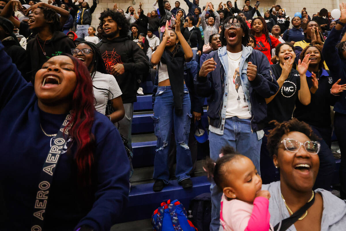 Democracy Prep fans cheer in the final moments of a boys basketball game between Mater East and ...