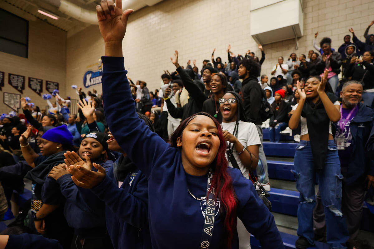 Democracy Prep fans cheer in the final moments of a boys basketball game between Mater East and ...