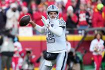 Las Vegas Raiders quarterback Aidan O'Connell passes during an NFL football game against the Ka ...