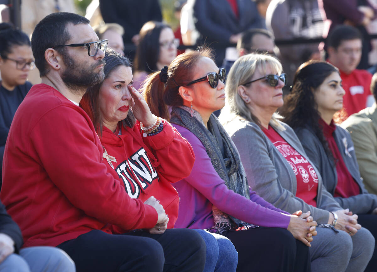 UNLV students and faculty members, including Ted Weisman and his wife Annie, left, both faculty ...