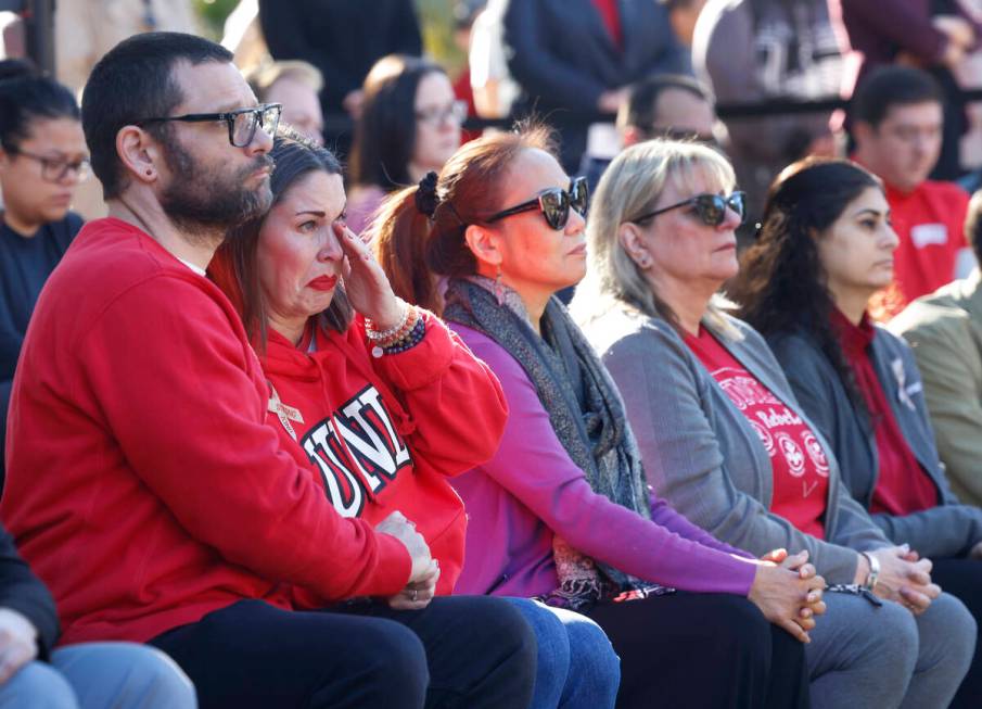 UNLV students and faculty members, including Ted Weisman and his wife Annie, left, both faculty ...