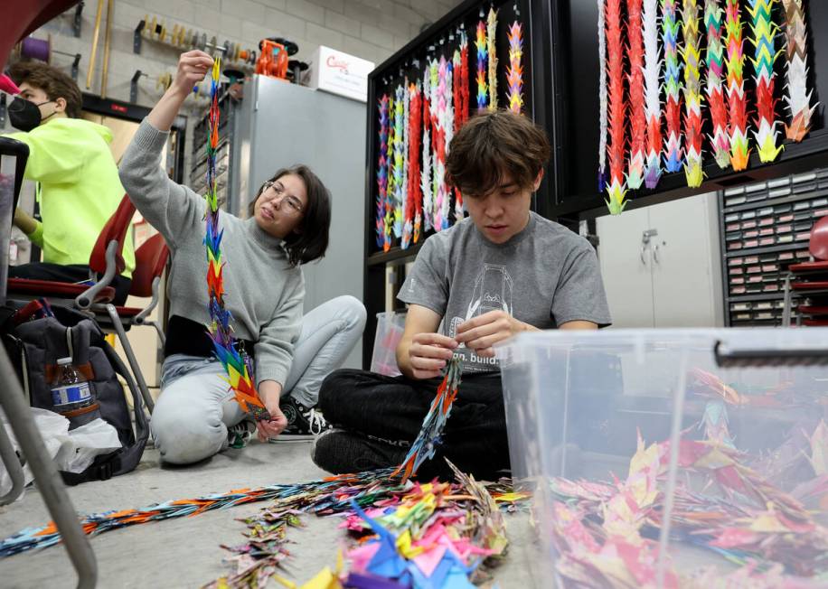 UNLV chemistry graduate student Rin Ruby, left, and mechanical engineering major Alex Hironaka ...