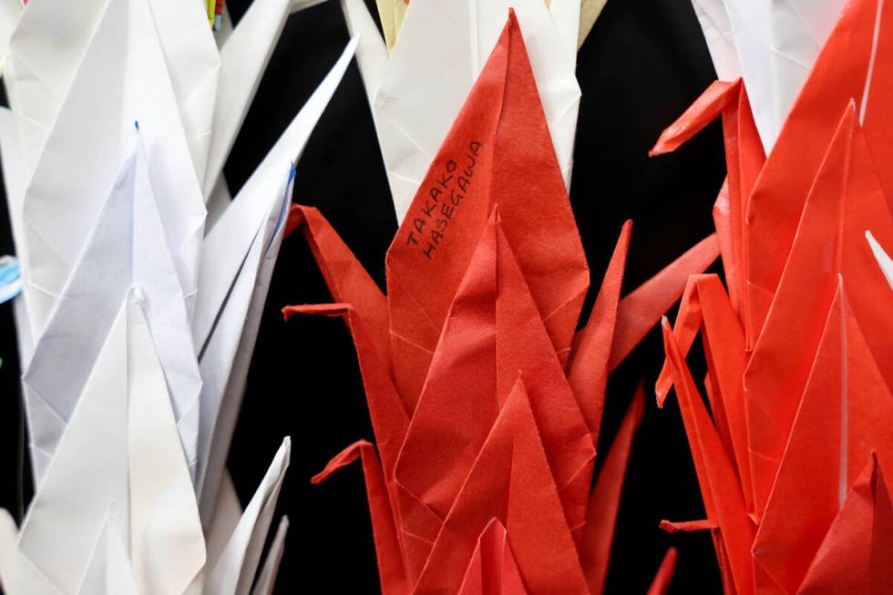 Some of the 4,000 paper cranes are shown Wednesday, Dec. 4, 2024, to honor and remember three p ...