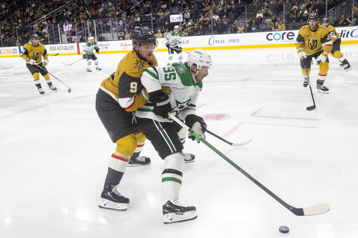 Golden Knights center Jack Eichel (9) and Dallas Stars center Matt Duchene (95) compete for the ...