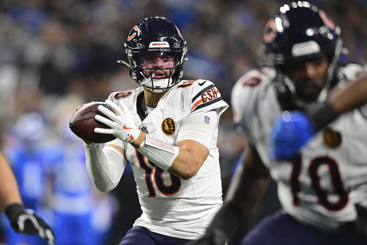 Chicago Bears quarterback Caleb Williams looks to pass during the second half of an NFL footbal ...