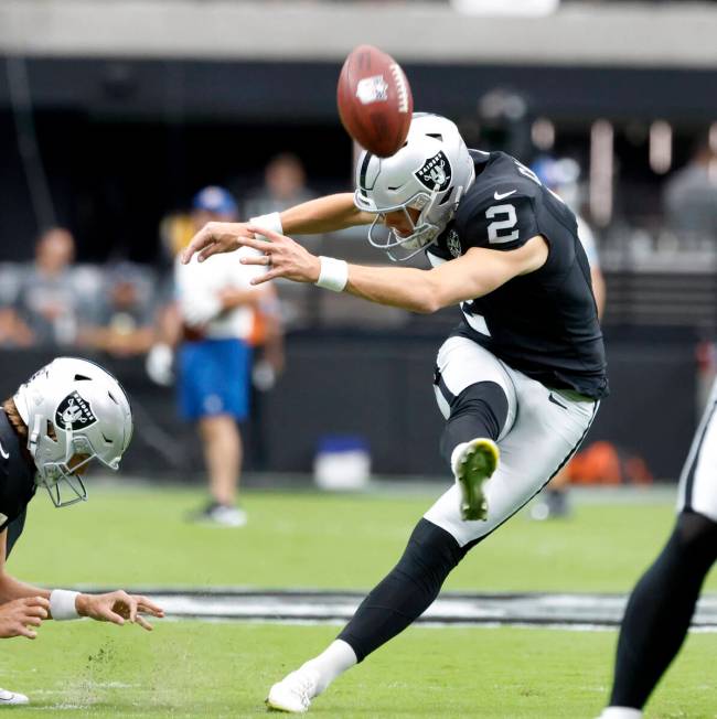 Raiders place kicker Daniel Carlson (2) kicked the ball before an NFL game against the Clevela ...