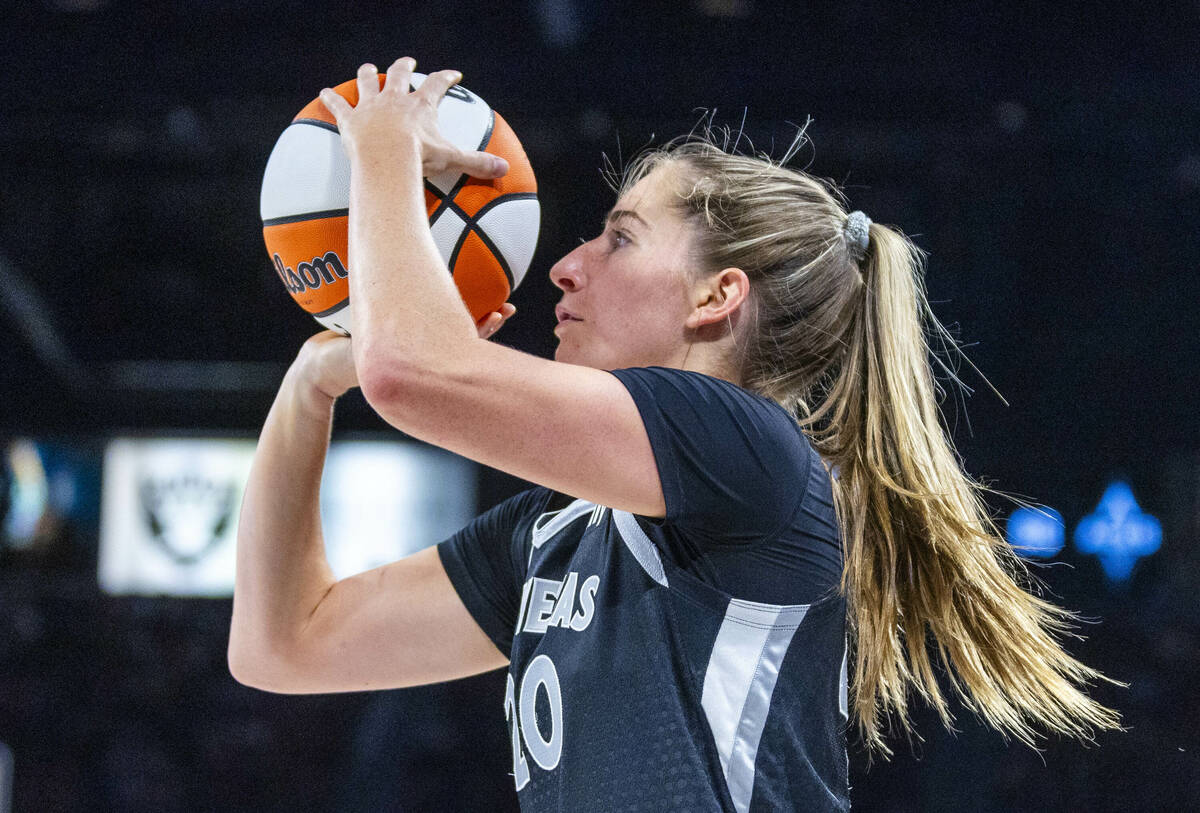 Aces guard Kate Martin (20) looks to shoot a basket against the New York Liberty during the sec ...