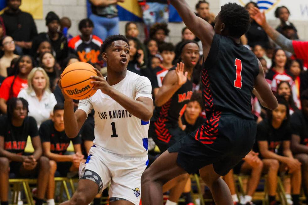 Democracy Prep guard Jamarian Taylor drives the ball during a boys basketball game between Mate ...