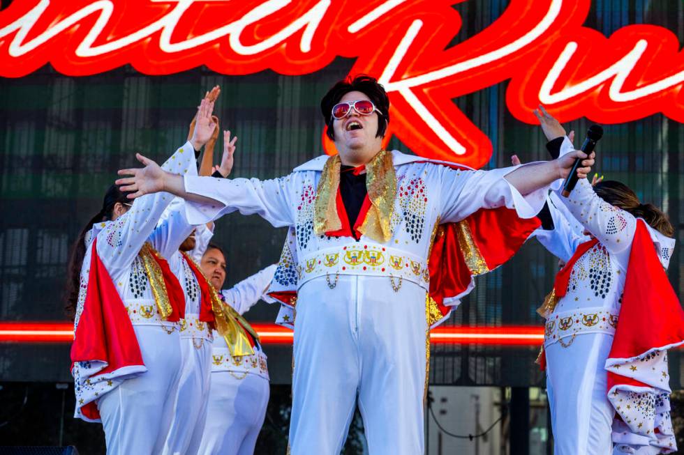 The OV Elvi perform on stage at the Downtown Las Vegas Events Center before thousands of Santas ...