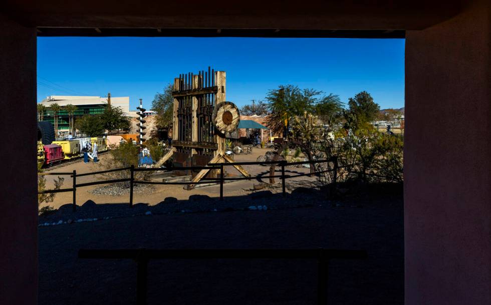 A former stamp mill is on display along with other equipment within The Mine Experience at the ...