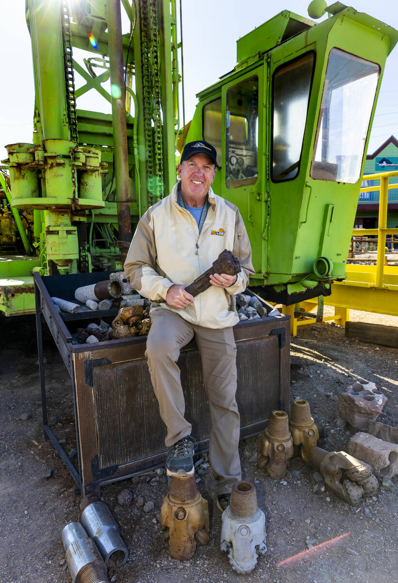 Executive Director Phil Luna with The Mine Experience beside a drilling machine at the McCaw ST ...