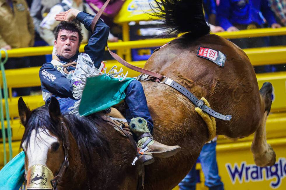 Bareback rider Bradlee Miller keeps his grip on Captain Hook during round three of the National ...