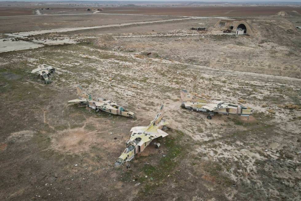 Decommissioned Syrian Air Force planes are seen at the Abu al-Duhur military airport, east of I ...