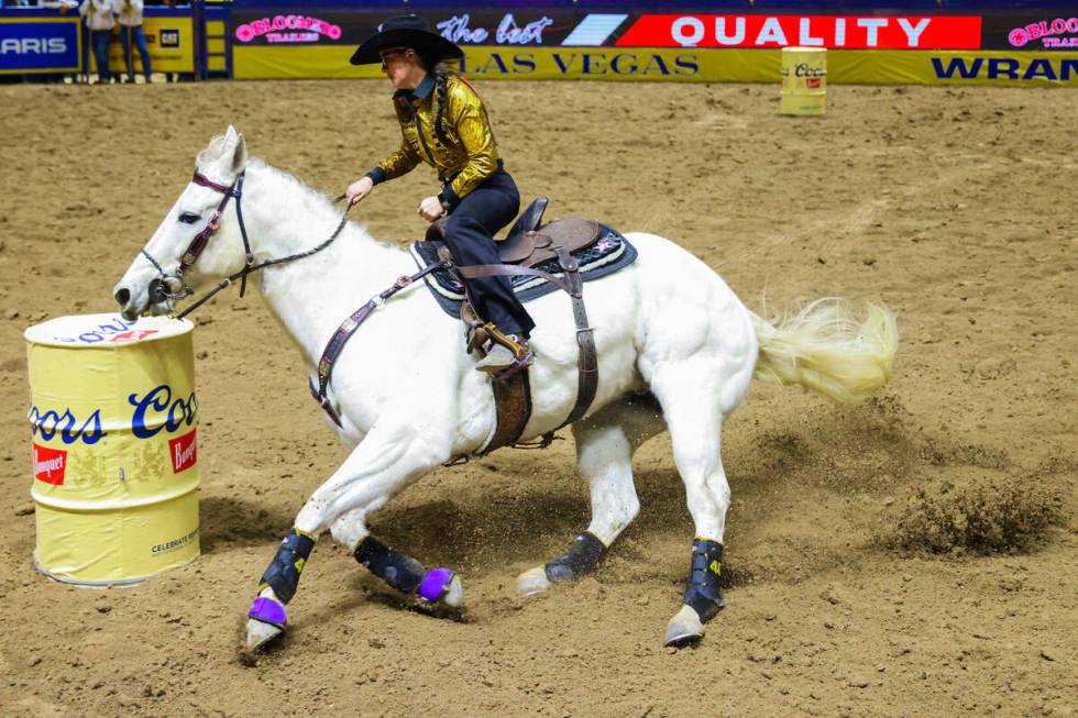 Barrel racer Ashley Castleberry rounds a barrel during round four of the National Finals Rodeo ...