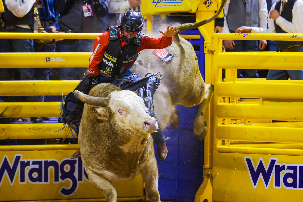 Bull rider Wacey Shalla breaks out of the chute on Alberta Prime Devil’s Advocate during ...