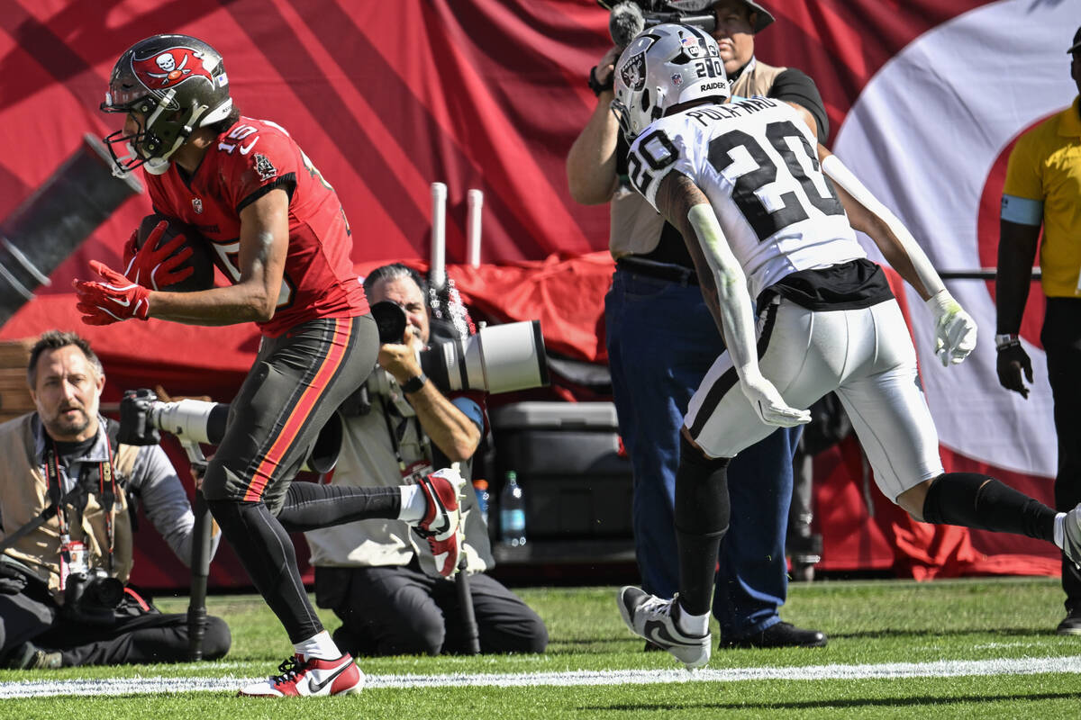 Tampa Bay Buccaneers wide receiver Jalen McMillan (15) scores a touchdown against Las Vegas Rai ...