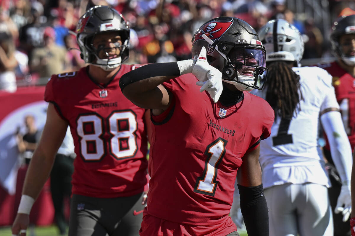 Tampa Bay Buccaneers running back Rachaad White (1) celebrates his touchdown against the Las Ve ...