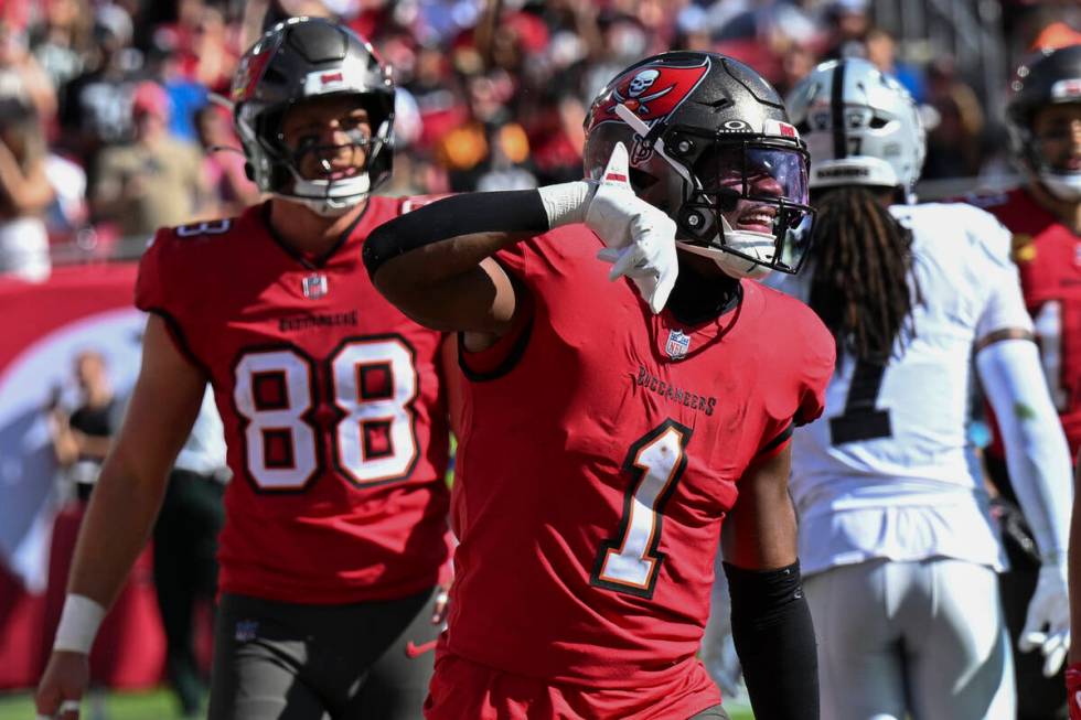 Tampa Bay Buccaneers running back Rachaad White (1) celebrates his touchdown against the Las Ve ...