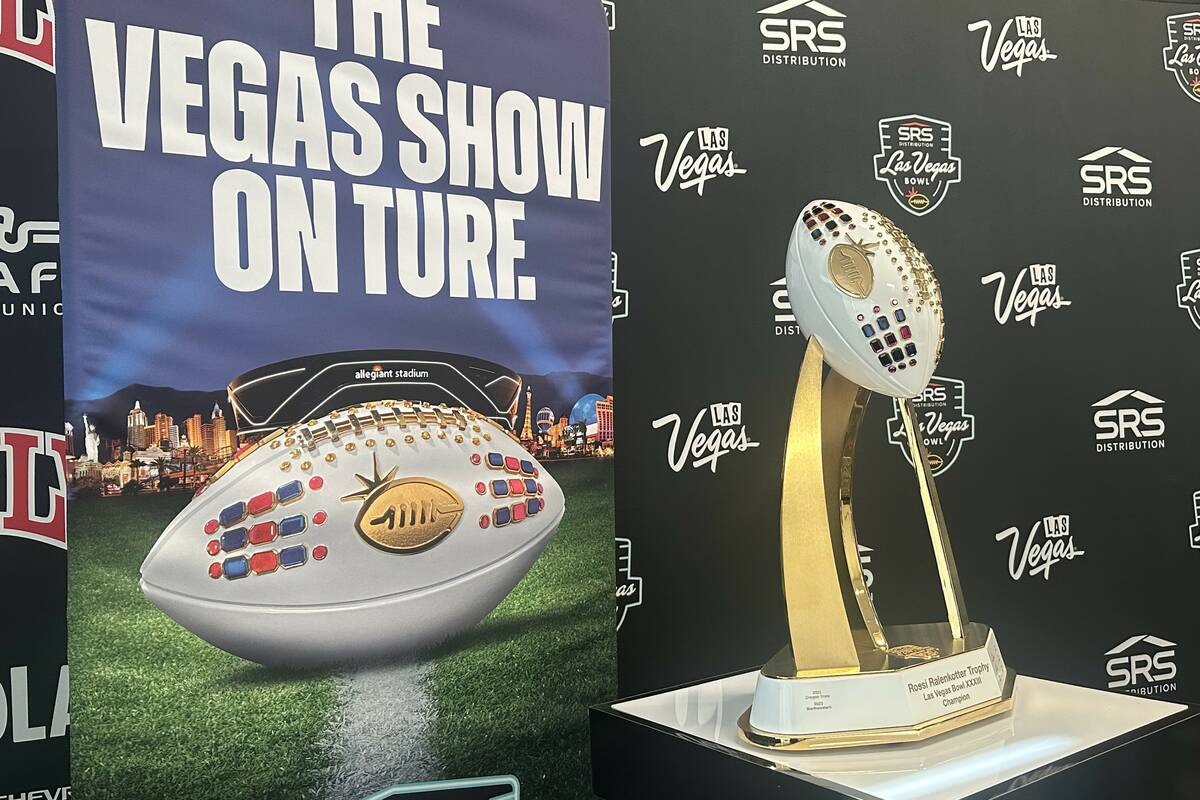 The trophy for the Las Vegas Bowl is on display before the announcement of this year's matchup ...