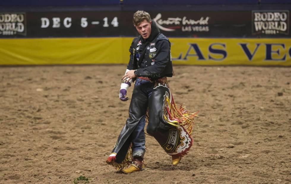 Jacob Lees reacts after competing in bareback riding during the fifth go-round of the National ...