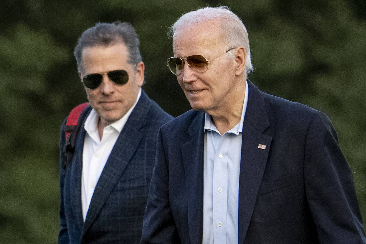 FILE - President Joe Biden, and his son Hunter Biden. (AP Photo/Andrew Harnik, File)