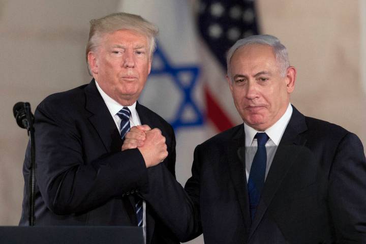 FILE - President Donald Trump and Israeli Prime Minister Benjamin Netanyahu shake hands at The ...