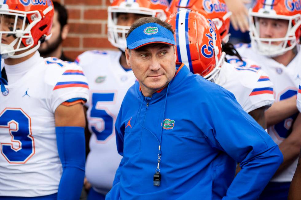 Florida head coach Dan Mullen prepares to lead his team on the field prior to the start of an N ...