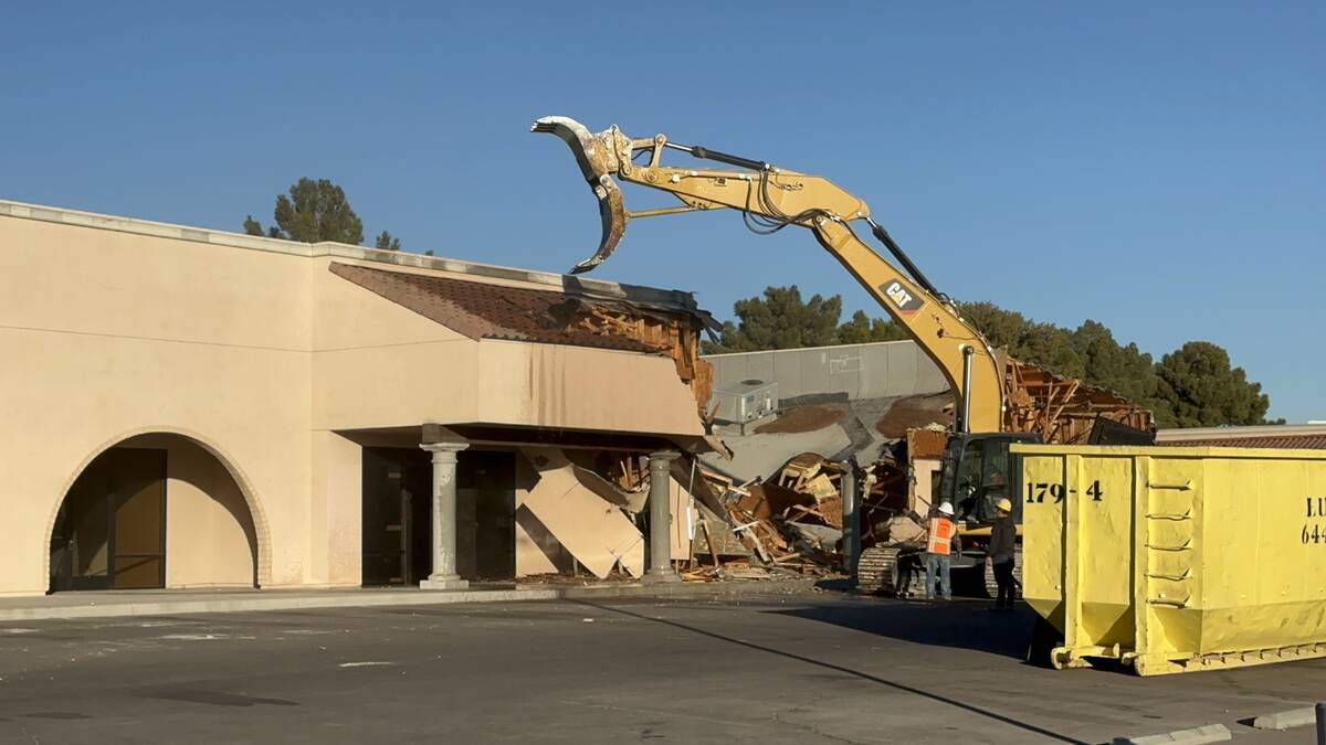 A building on South Eastern Avenue is demolished in the Central East part of the valley to make ...