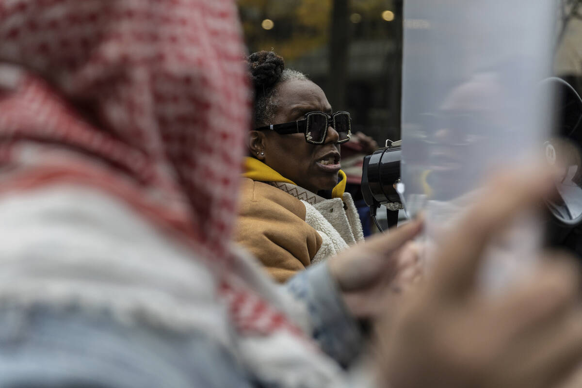 A person protests the not guilty verdict of Daniel Penny outside the criminal court, Monday, De ...