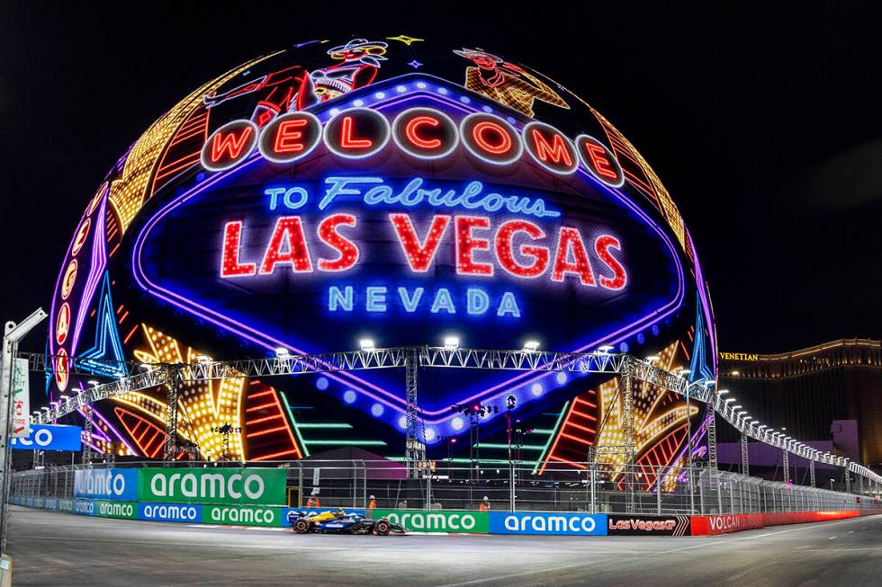 A race care navigates around the MSG Sphere during the qualifying round for the Formula 1 Las V ...