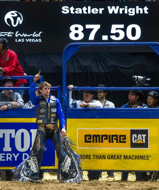 Saddle Bronc Riding contestant Statler Wright celebrates after riding Jessica Rabbit to a winni ...