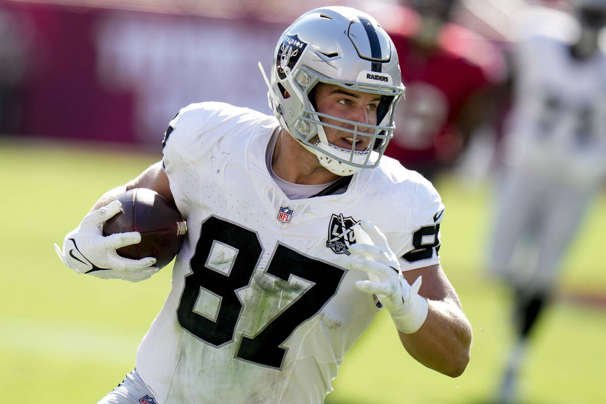 Las Vegas Raiders tight end Michael Mayer (87) runs after a catch against the Tampa Bay Buccane ...