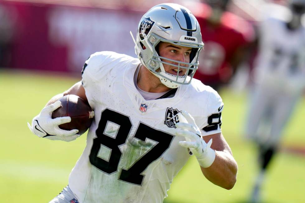 Las Vegas Raiders tight end Michael Mayer (87) runs after a catch against the Tampa Bay Buccane ...